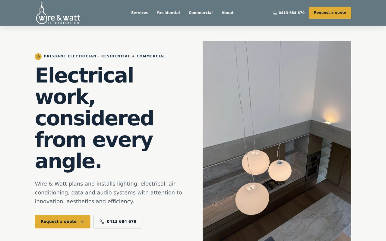 Wire & Watt Electrical website shown on a laptop